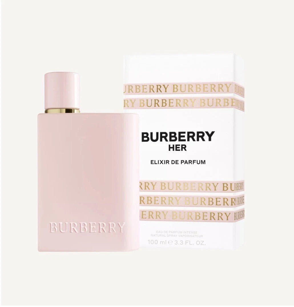 Burberry Her Elixir de Parfum 100ml bottle in a soft pink color with a gold accent collar, shown next to its white packaging box featuring gold and black text.