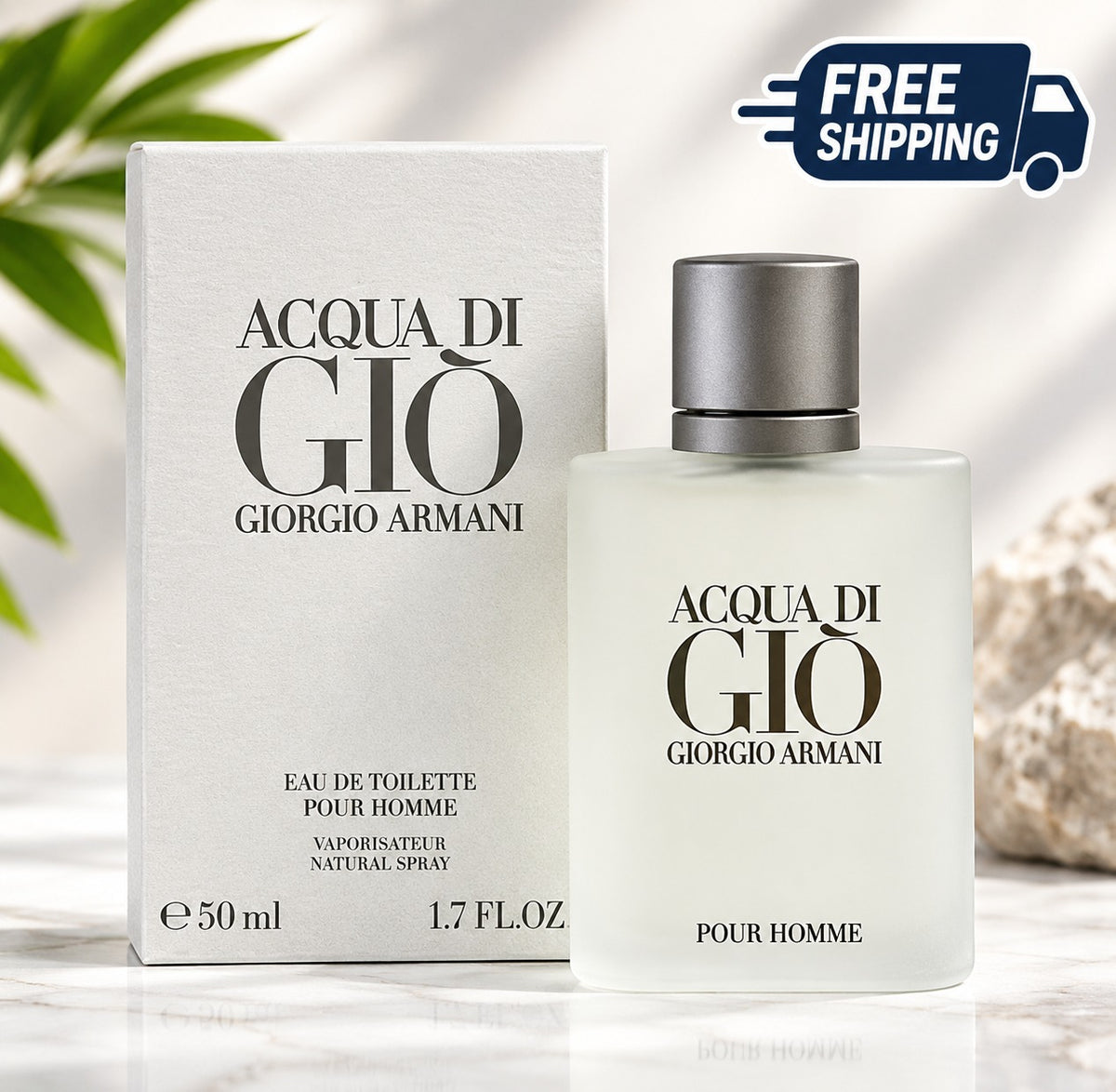 Giorgio Armani Acqua di Gio Eau de Toilette perfume bottle and its packaging box, displayed on a reflective white surface with a marble background, a green leaf in the background, and a 'FREE SHIPPING' graphic overlay in the top right corner.
