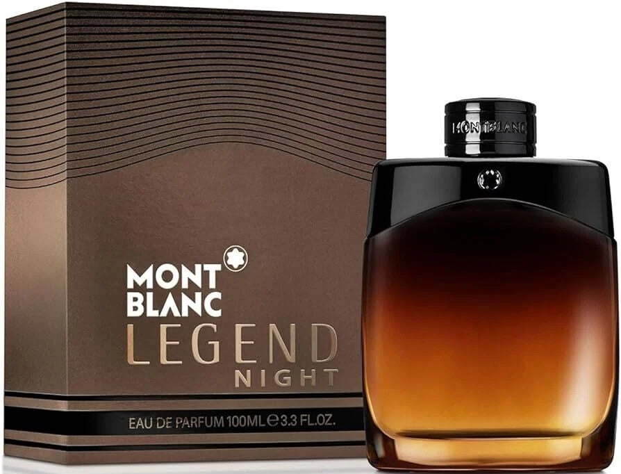 Montblanc Legend Night Eau de Parfum 100ml bottle next to its brown packaging box, featuring a dark amber gradient glass bottle and a black cap on a white background.